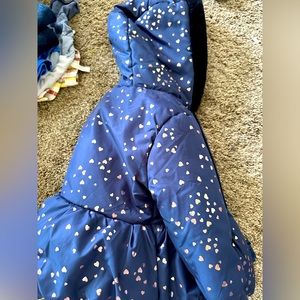 Rothschild 24M winter coat with hood and pockets. Fleece lined, faux fur on hood